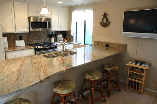 kitchen with flat screen on wall