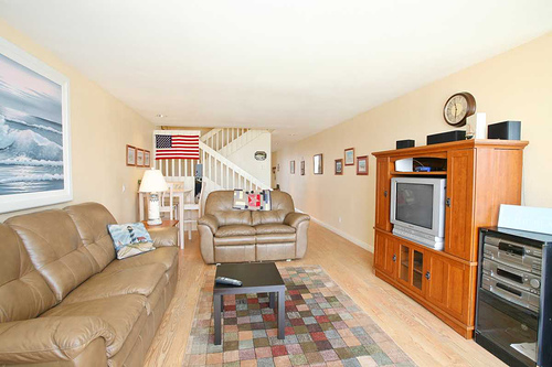 living room showing stairs living room showing stairs